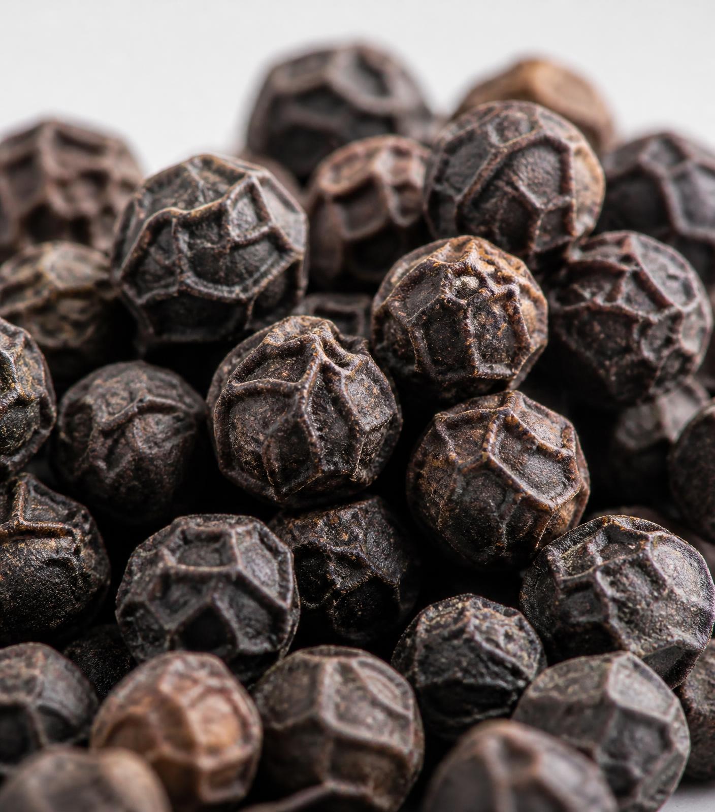 Close-up of premium dried black peppercorns